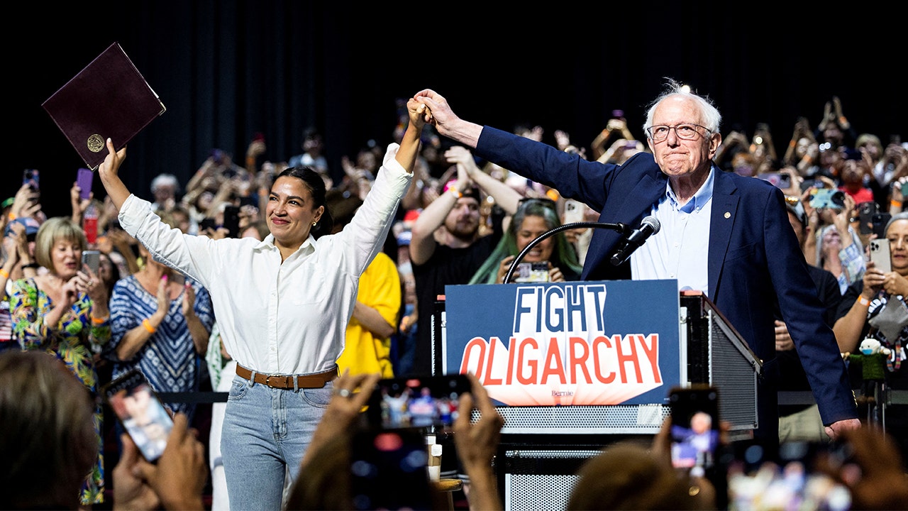 Rep. Alexandria Ocasio-Cortez, D-N.Y., and Sen. Bernie Sanders, I-Vt., participate in a stop on the "Fighting Oligarchy" tour in Bakersfield, Calif., on April 15, 2025. Reuters Photos