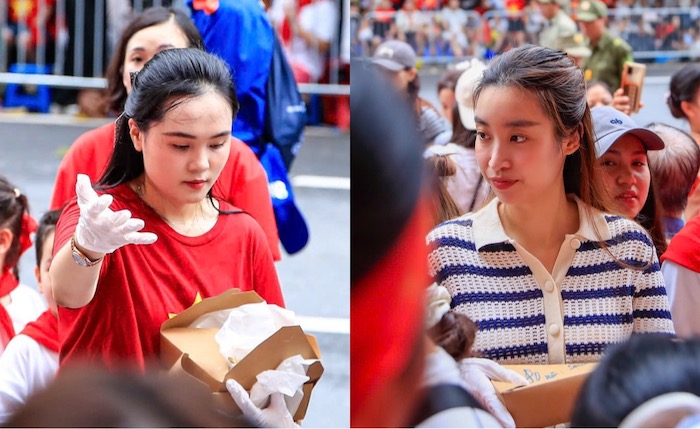 Hoa hậu Đỗ Mỹ Linh, vợ Duy Mạnh tặng đồ ăn cho người dân xem diễu binh