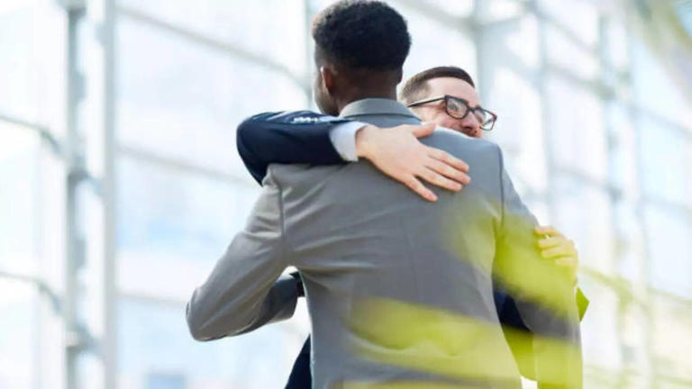 What is 'Job Hugging' and why is it trending on the Internet?