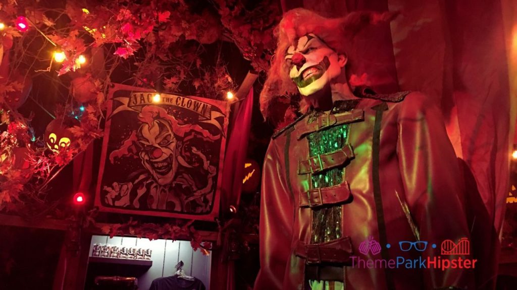 Jack the Clown and Jack the Clown memorabilia on the wall at the Tribute Store at Halloween Horror Nights. Keep reading to discover more about Halloween Horror Nights Stay and Scream at Universal Orlando.