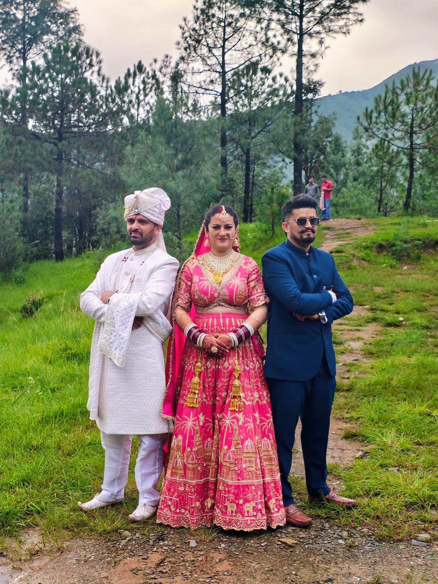Brothers Pradeep and Kapil with their bride (Facebook)