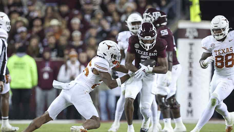 Former Arch Rival Texas Coaches Cheering for Longhorns vs. Ohio State