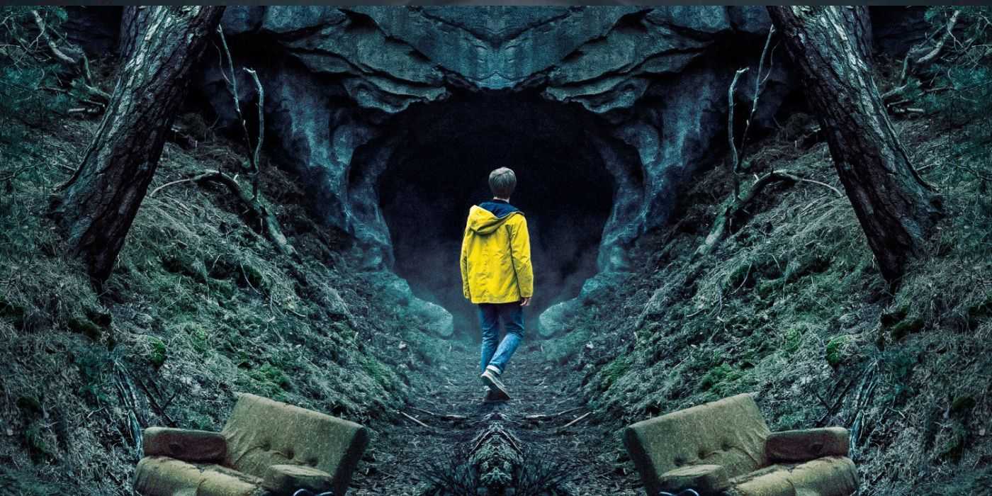 A young man wearing a yellow anorak and entering a cave in the TV show Dark