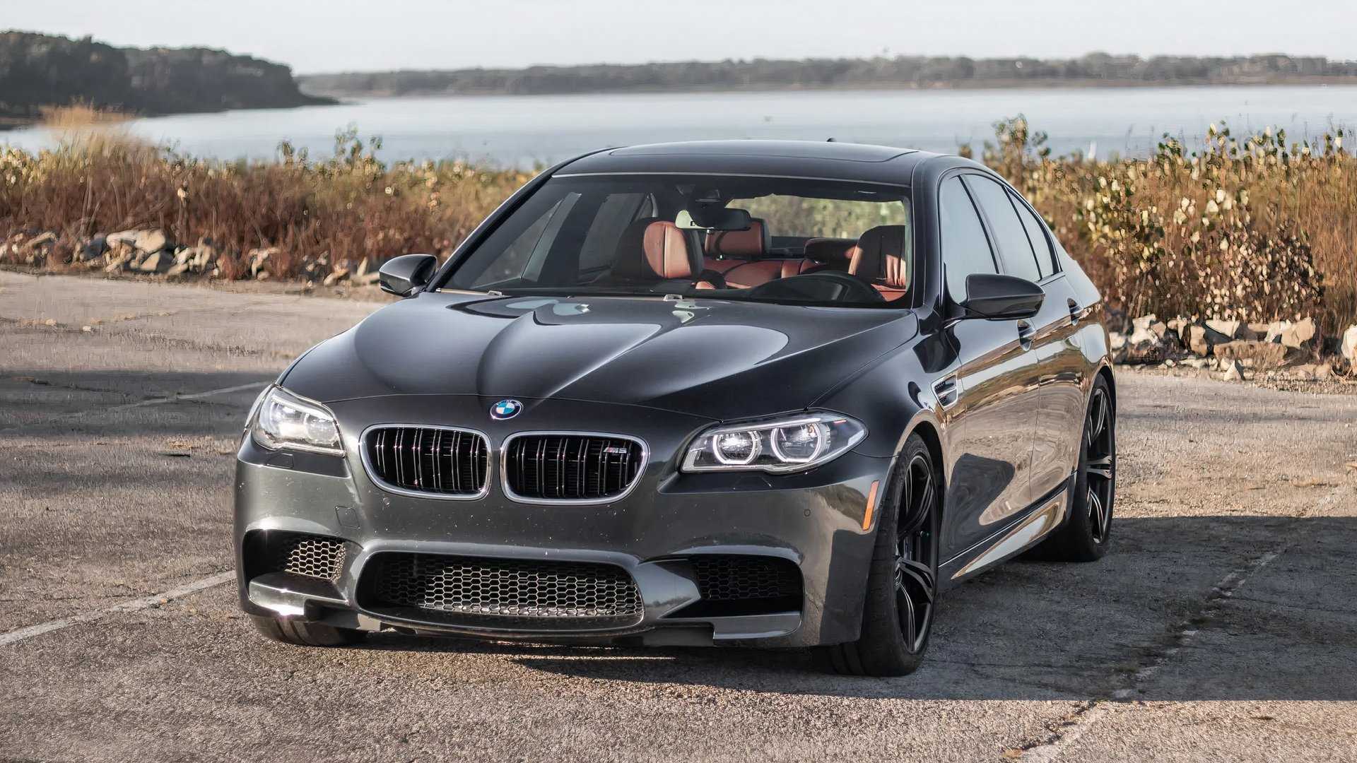 2015 BMW M5 Competition in black parked