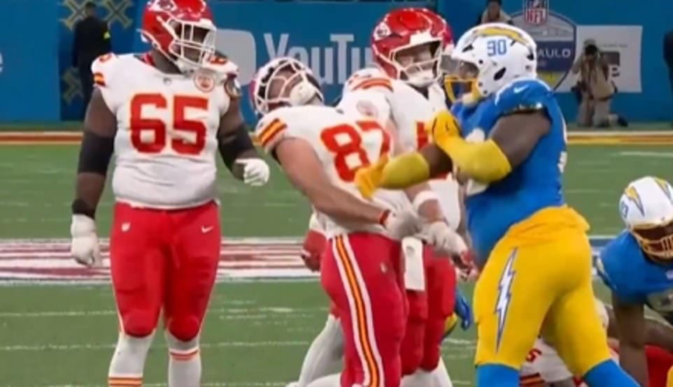 Travis Kelce smacked in the helmet by Chargers rival