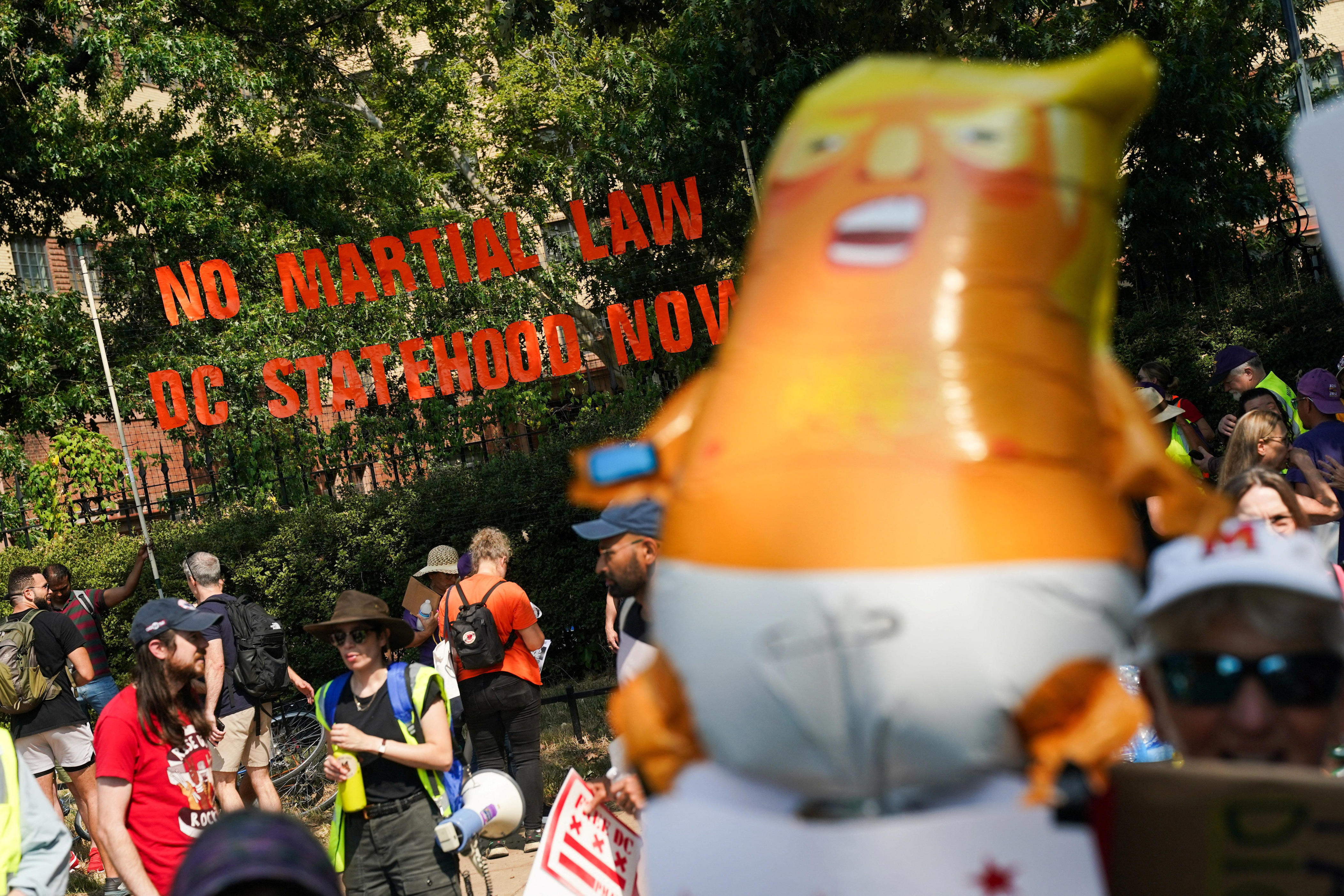 Washington DC rallies in protest of Trump's federal troops. See photos.