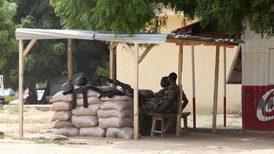 Nigeria troops man a checkpoint in Maiduguri, Nigeria, Wednesday, Sept, 28. 2011