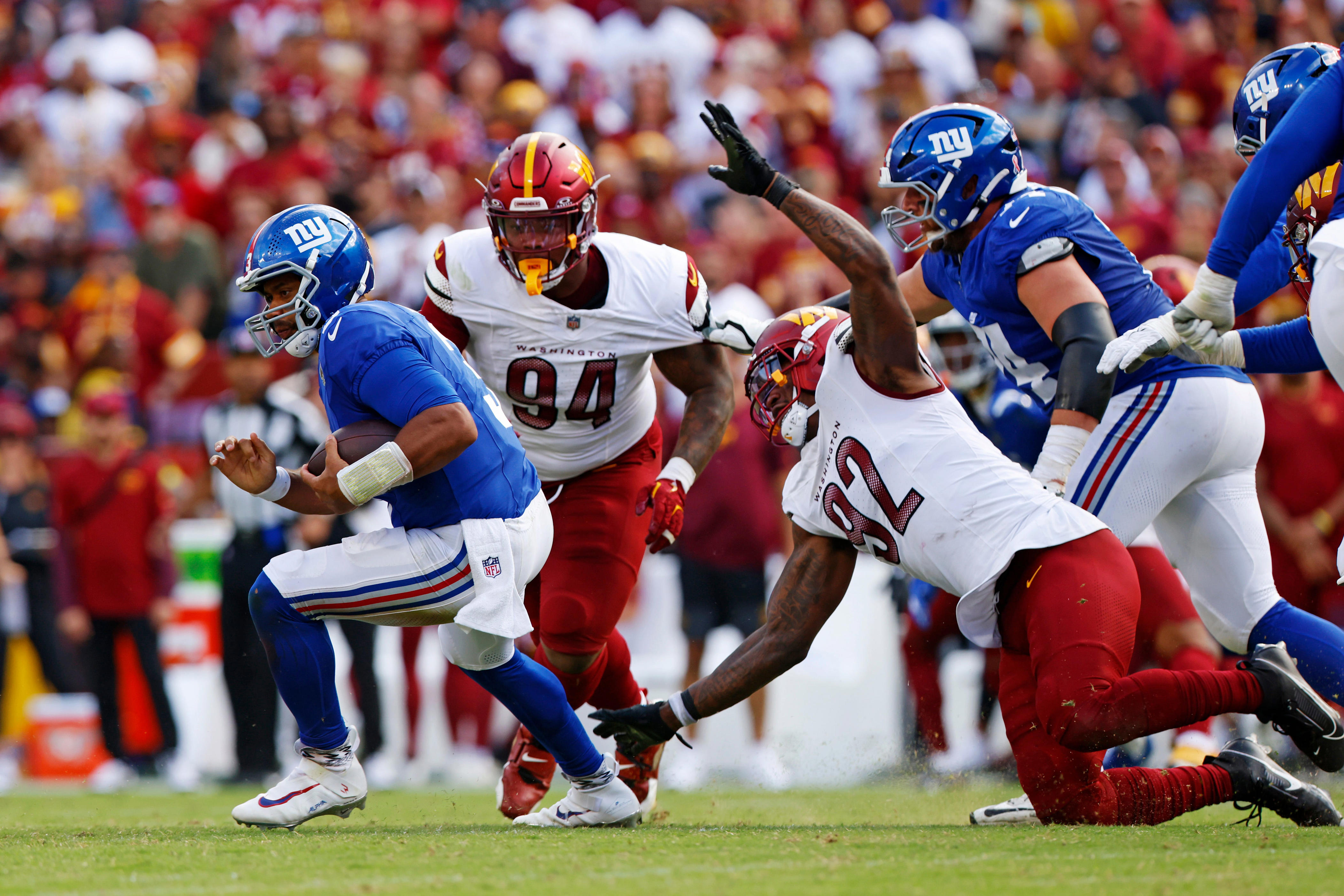 What will the Commanders do at defensive end after numerous injuries?