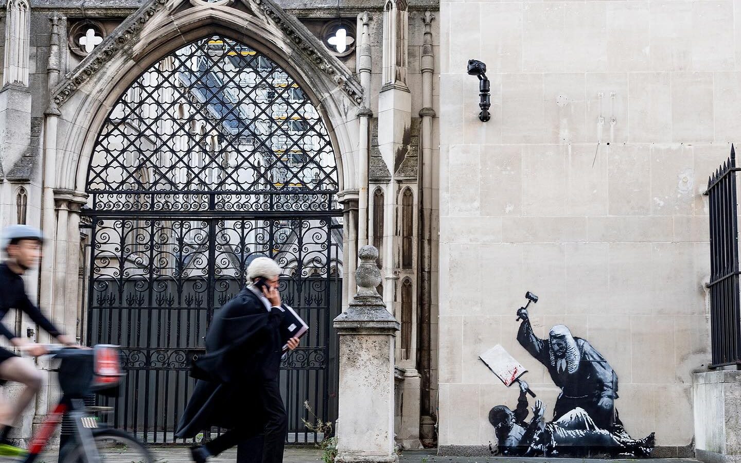 The graffiti outside the Royal Courts of Justice in London