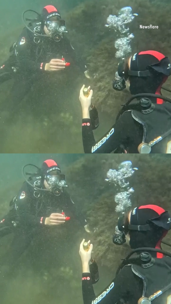 Diver Stages OneofaKind Underwater Proposal in the Black Sea