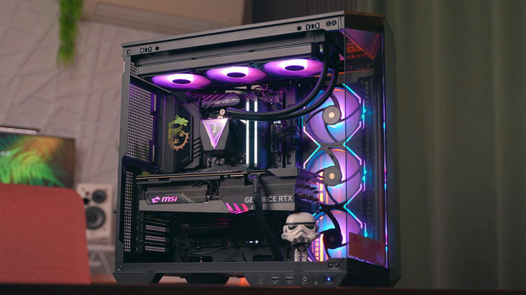 A photograph of an MSI-branded gaming PC on a desk.