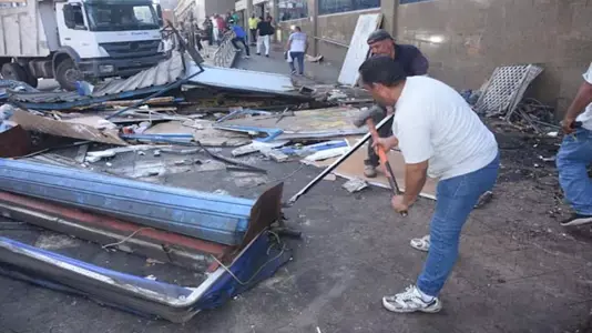 إزالة محال مخالفة وتعديات بالإسكندرية (13)