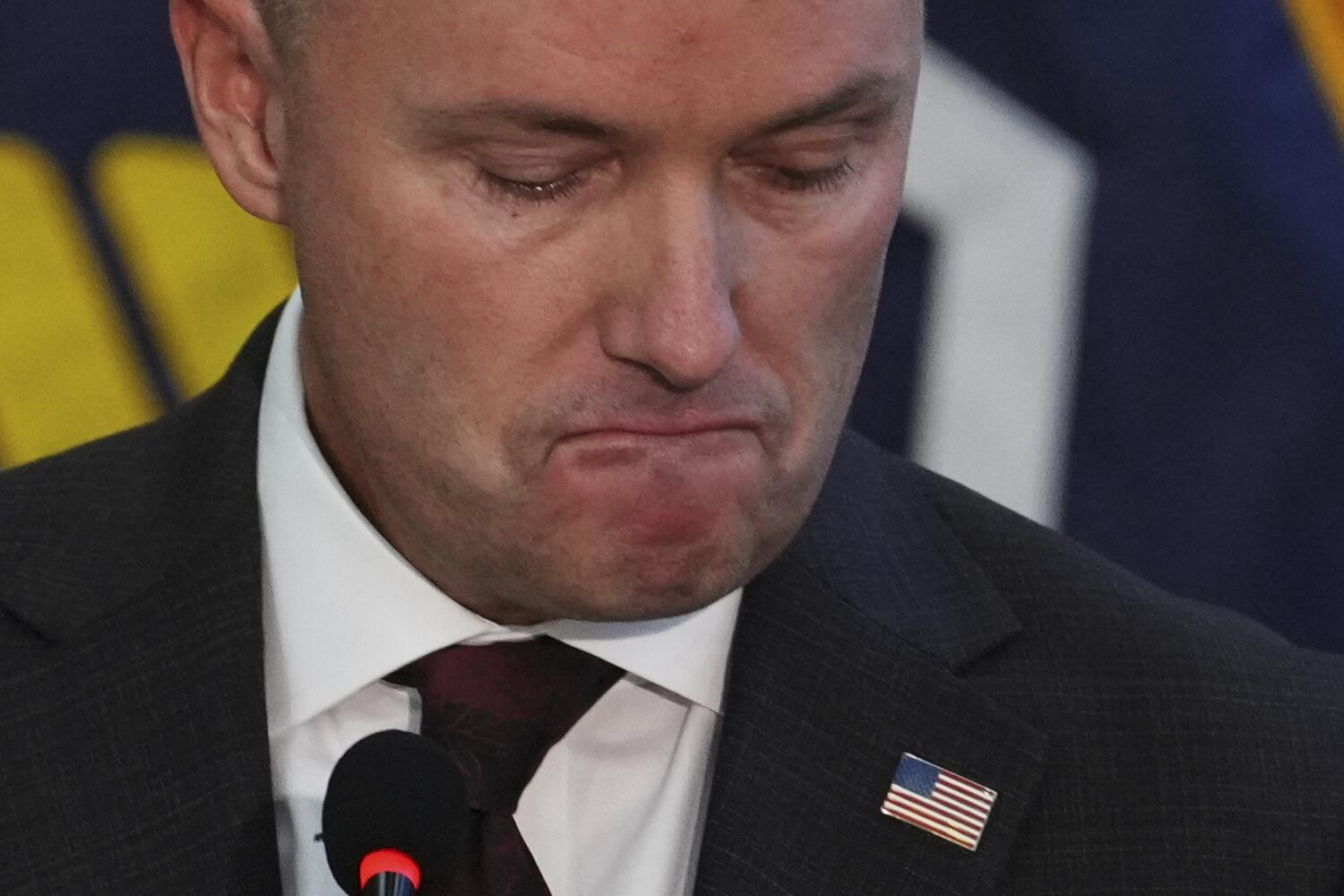 Utah Gov. Spencer Cox pauses as he speaks at a news conference Friday in Orem, Utah. ((Lindsey Wasson/AP))