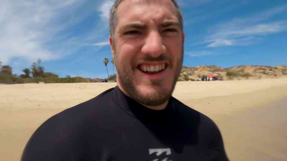 Taylor surfs during Baja beach camping and sees whales