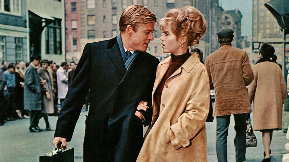 Robert Redford and Jane Fonda walking arm in arm on a Manhattan street from the 1967 film