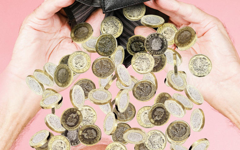 Bag of money being emptied