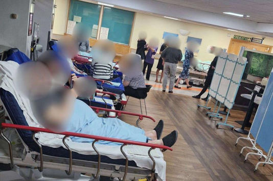 Patients are being treated on beds in the Costa café branch (Cover Images)