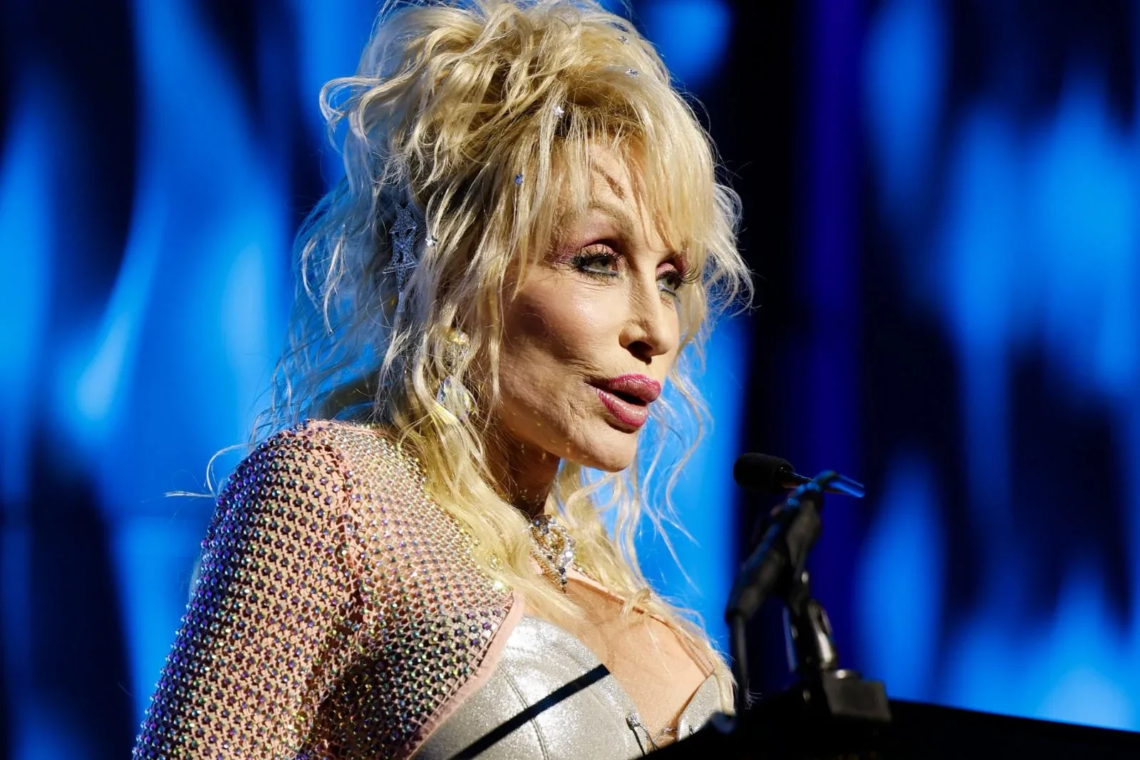 Dolly Parton Misses Dollywood Appearance Due to Kidney Stone, Infection