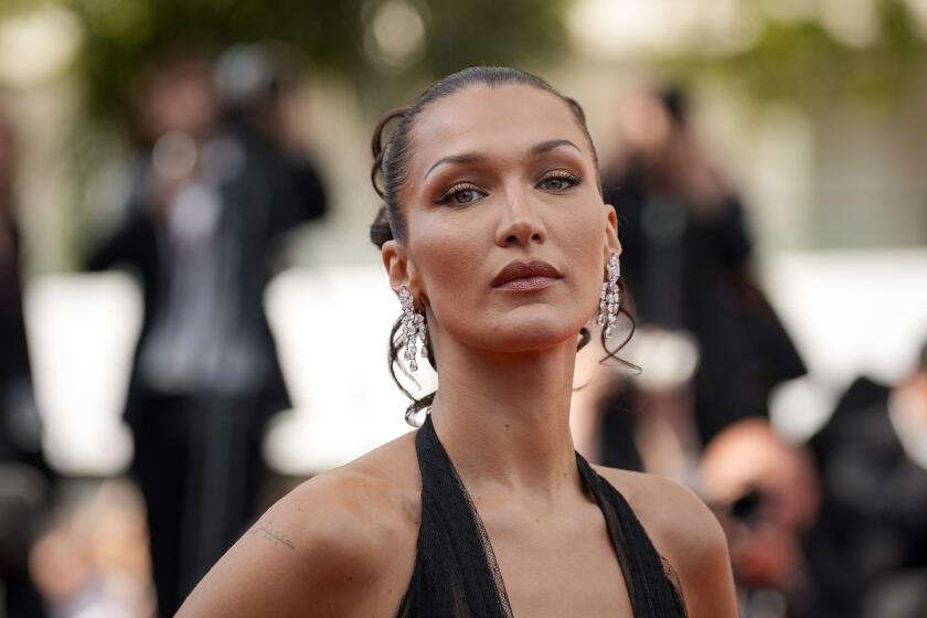 Bella Hadid is a 'Lyme warrior,' mom Yolanda says, as the model reveals