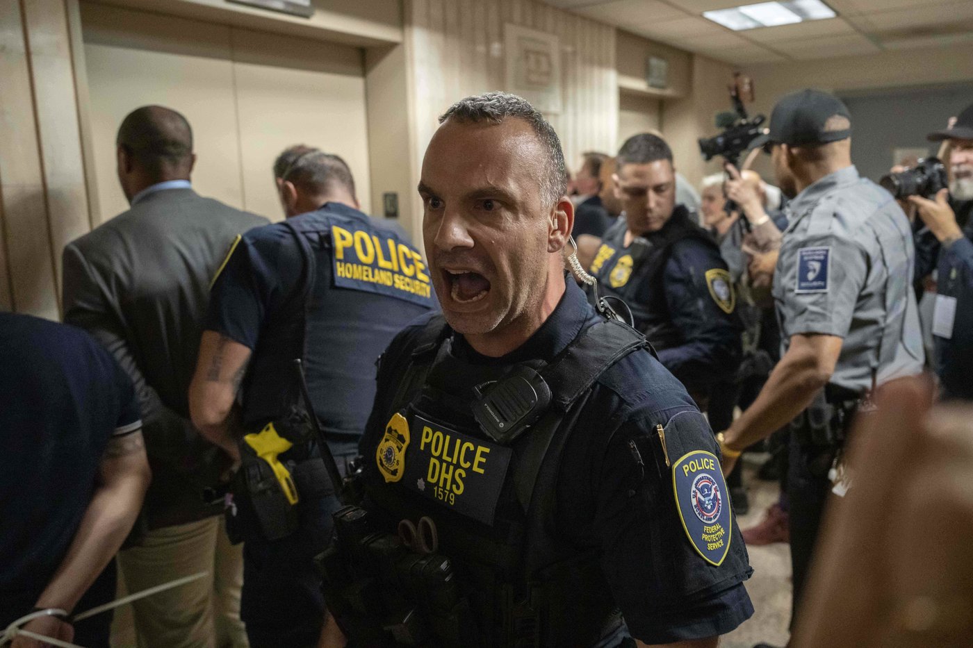 Federal agents detain elected officials after they demanded access to the inspect the detainment facility at immigration court at the Jacob K. Javits federal building, Thursday, Sept. 18, 2025, in New York. (AP Photo/Yuki Iwamura)