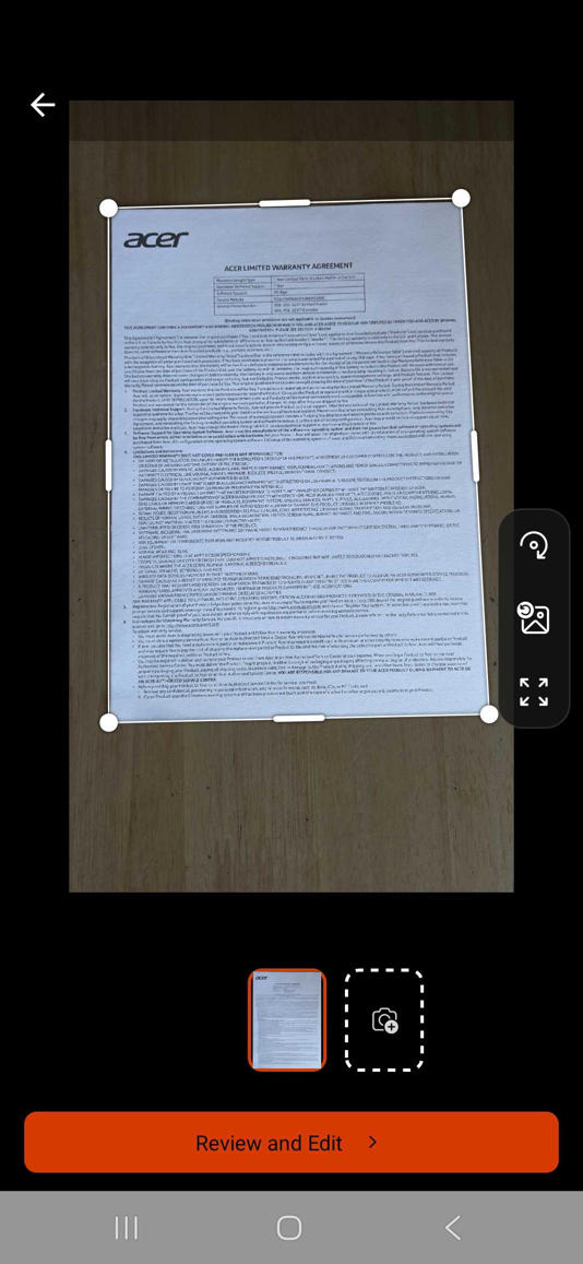 Showing one page of a document with the scan feature in the Microsoft Lens app with the orange Review and Edit button