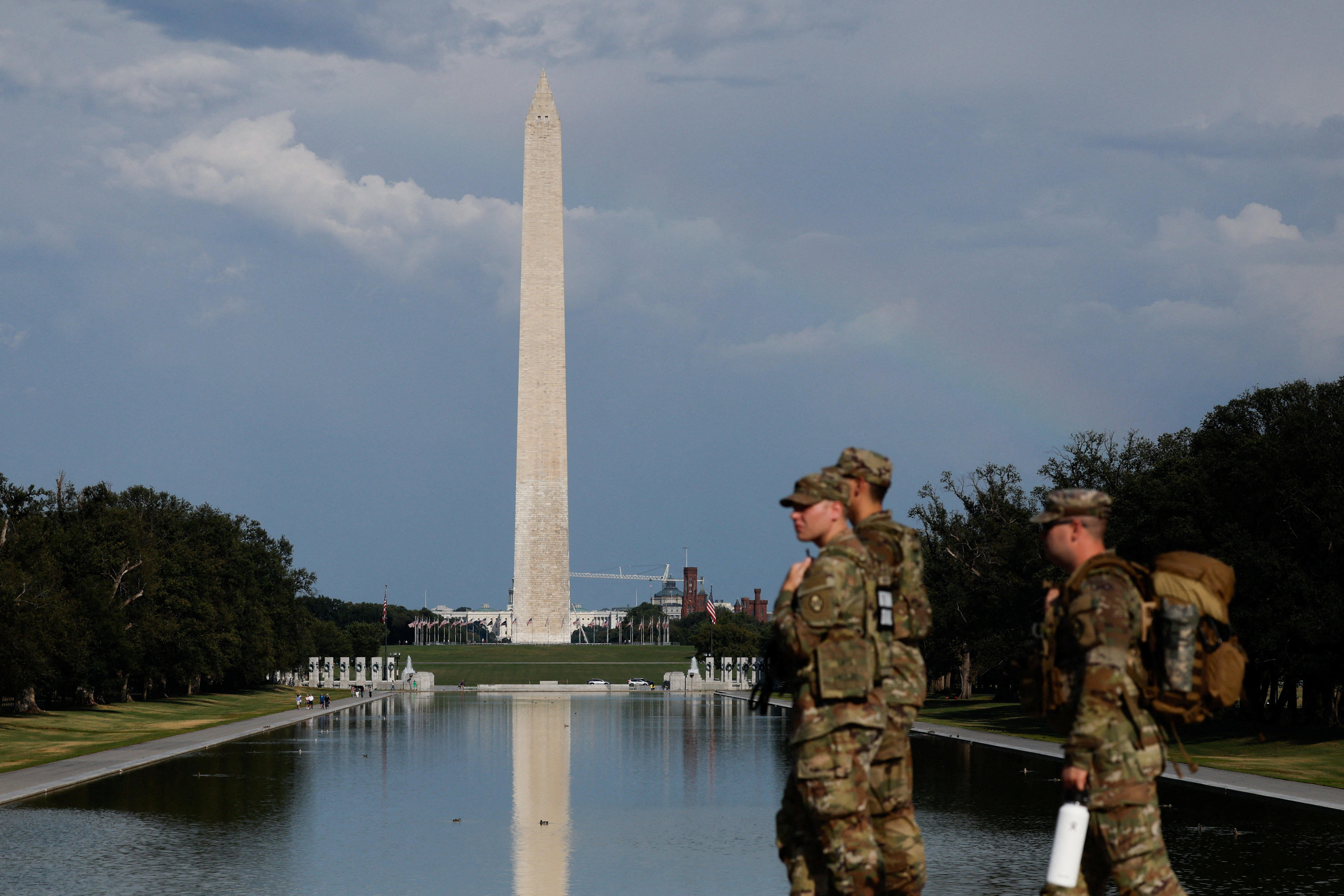 Why was a gold statue of Trump holding Bitcoin put up in DC? What we know