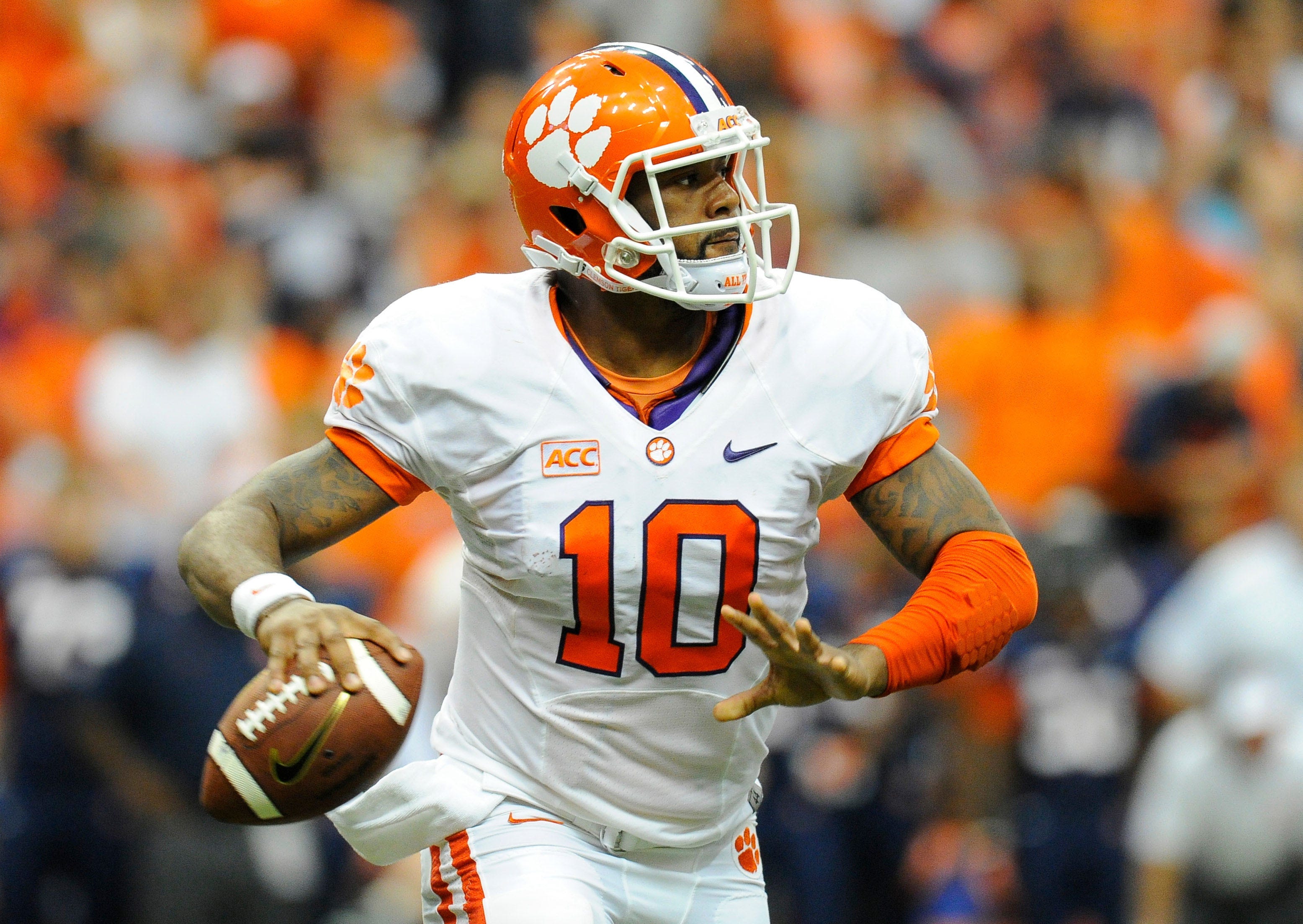 Oct 5, 2013; Syracuse, NY, USA; Clemson Tigers quarterback Tajh Boyd (10) drops back to pass during the second quarter against the Syracuse Orange at the Carrier Dome. Clemson defeated Syracuse 49-14. Mandatory Credit: Rich Barnes-USA TODAY Sports