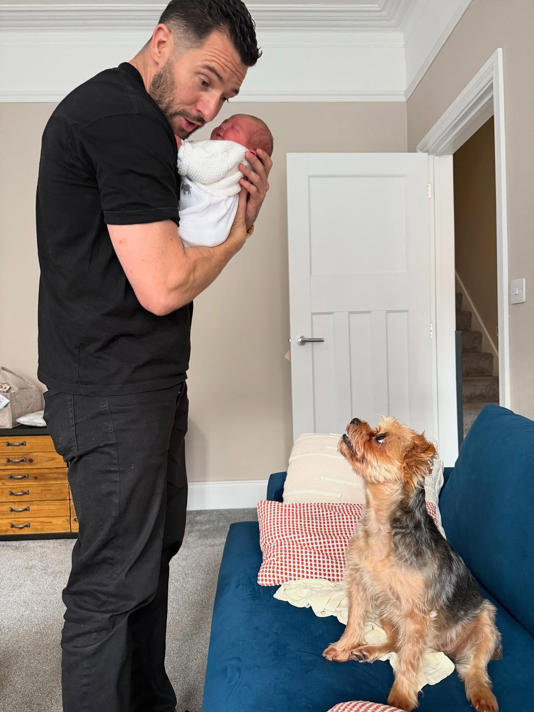 Of course, baby Suzie had to meet the family pooch (Picture: Instagram)