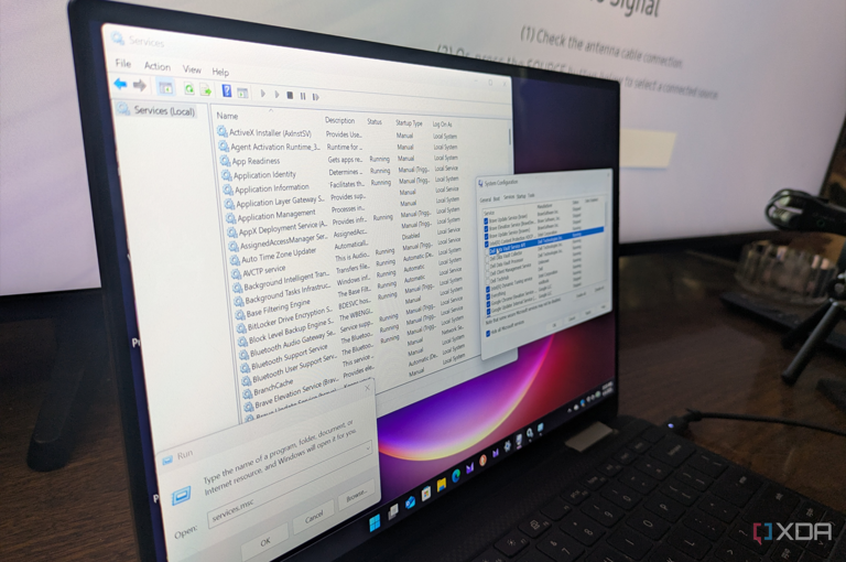 Shows a windows laptop running services and msconfig