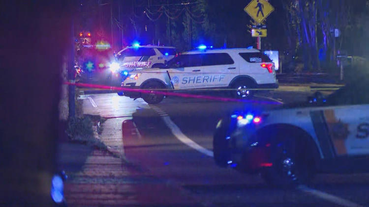 Store employee injured in Wood Village shooting, suspect at large