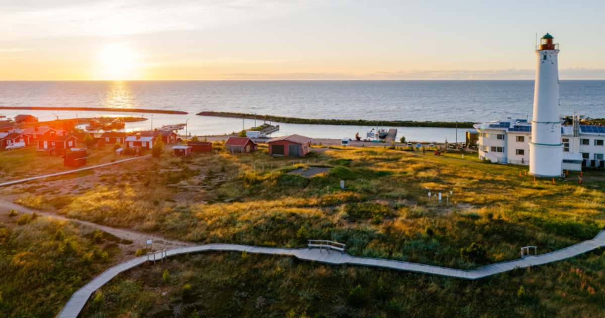 Aerial view of an old lighthouse and small fishing huts on Hailuoto island in Northern Finland (Representative Image Source: Getty Images | Photo by Miemo Penttinen)