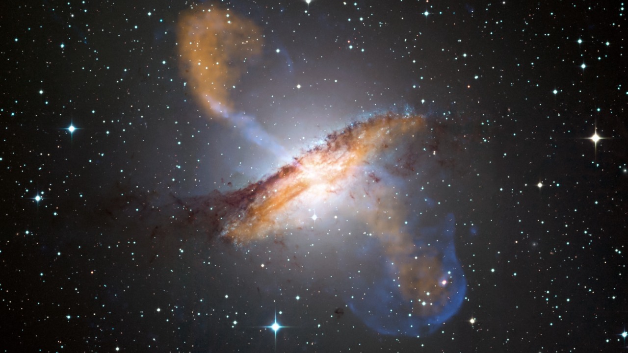 Image Credit: ESO/WFI (Optical); MPIfR/ESO/APEX/A.Weiss et al. (Submillimetre); NASA/CXC/CfA/R.Kraft et al. (X-ray) Derivative work including grading and crop: Julian Herzog - CC BY 4.0/Wiki Commons