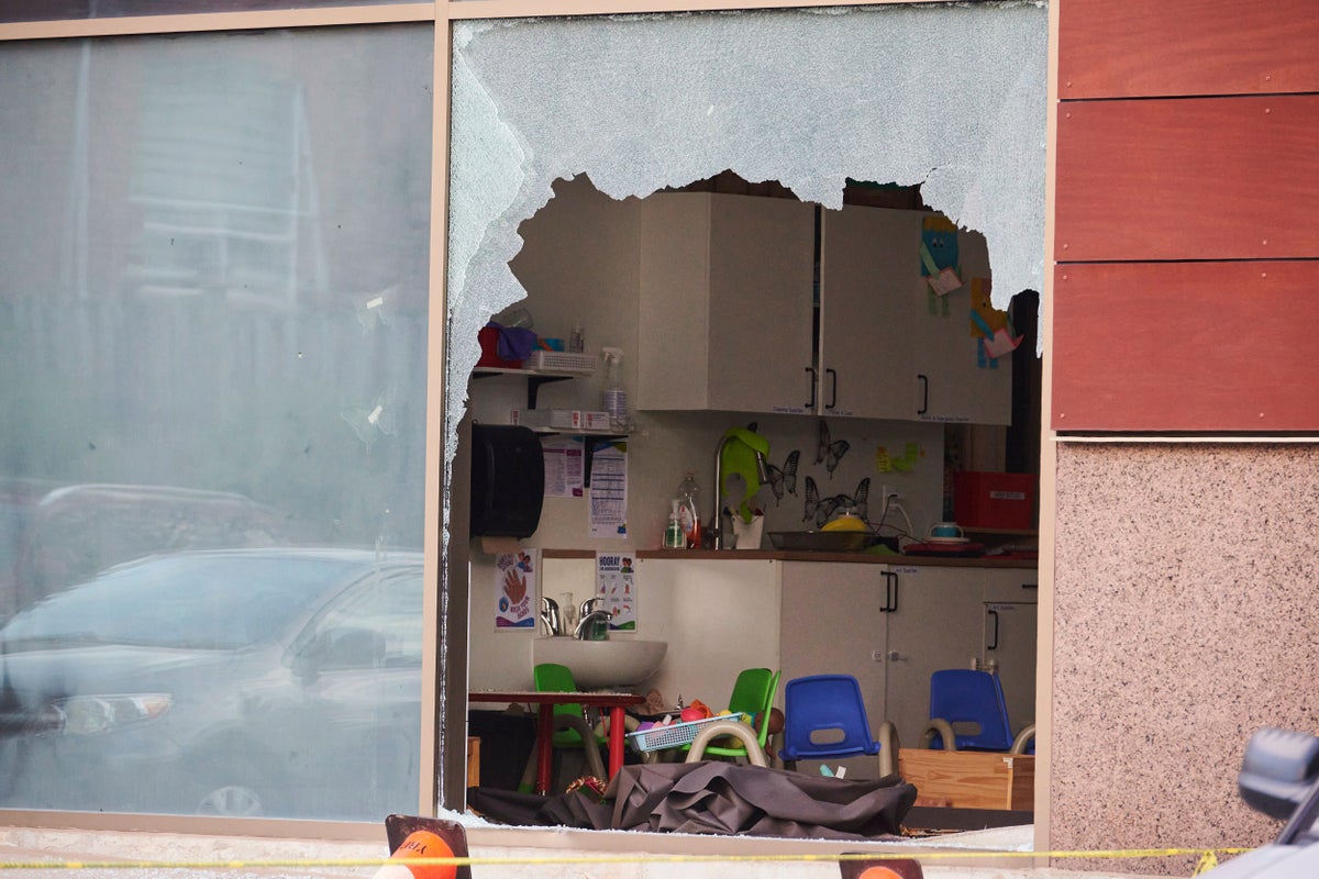 Toddler dead and nine injured after car crashes through daycare window