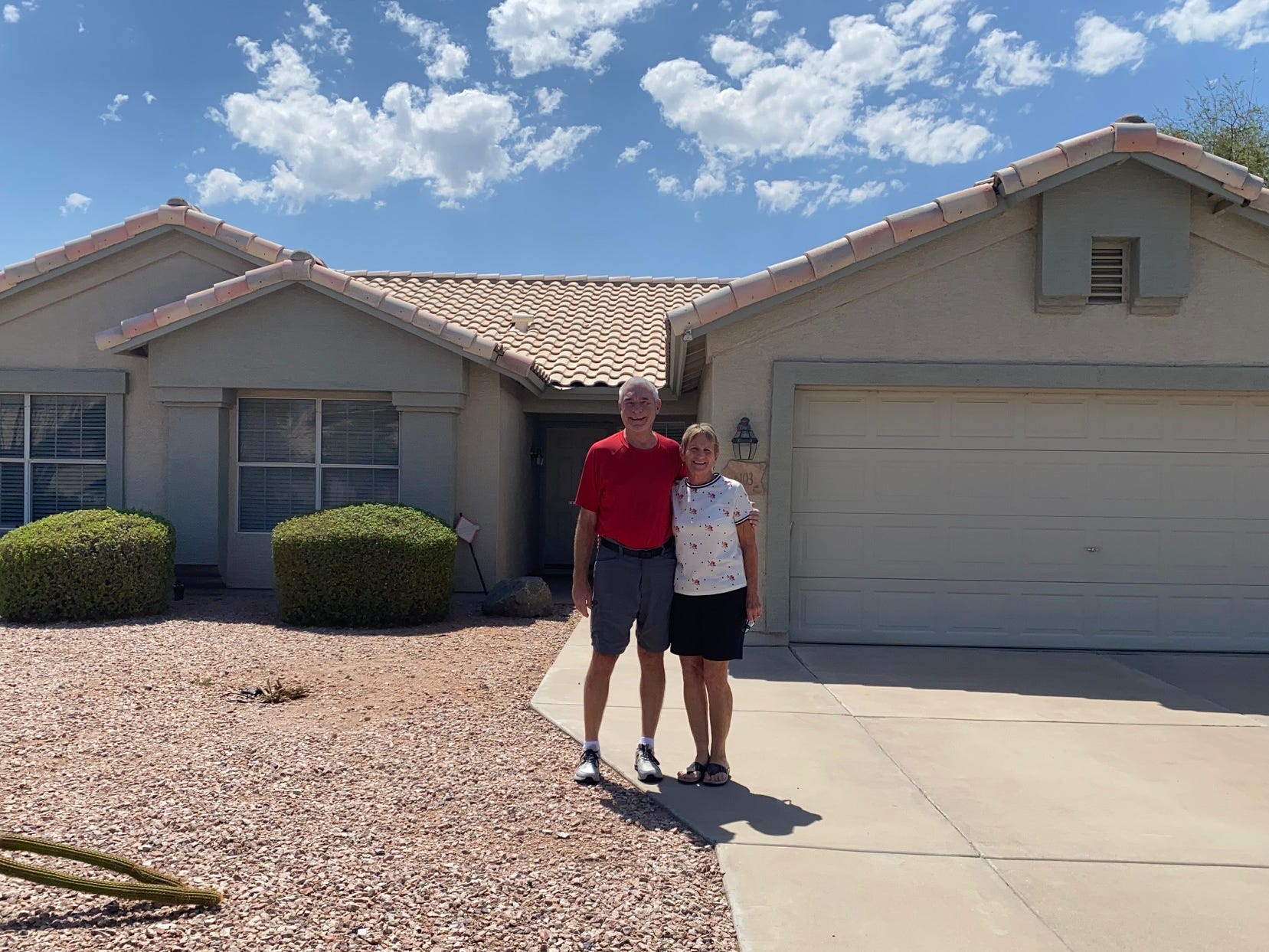 Tom and Jeanne Skellan outside their rental home in Mesa, Arizona.
