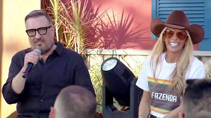 O diretor Rodrigo Carelli e a apresentadora Adriane Galisteu revelam as novidades da edição 2025 de A Fazenda Foto: RecordTV/Reprodução