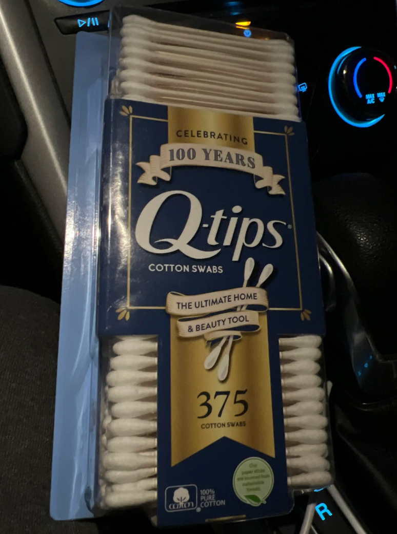 Packaging of Q-tips Cotton Swabs celebrating 100 years, labeled as the ultimate home and beauty tool, contains 375 swabs