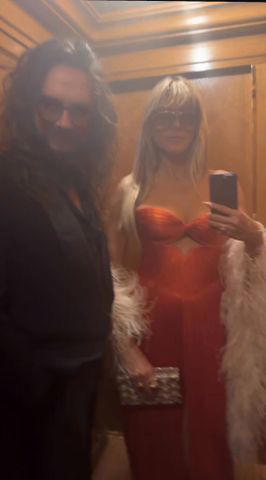 Instagram/Heidi Klum Heidi Klum wearing a pink dress with Tom Kaulitz on Friday, September 12