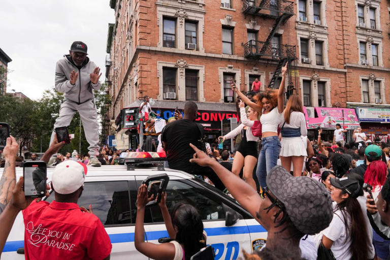 Cardi B dances on top of car during pop-up event ahead of new album release