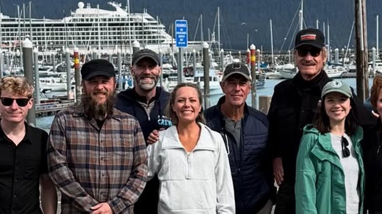 Dylan Dreyer poses next to several men, one of whom had his hand on her shoulder
