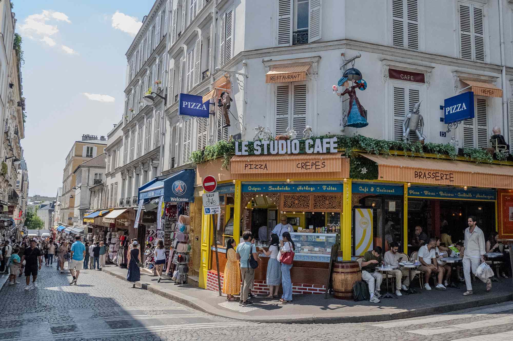Tourists and locals in the Montmartre neighborhood of Paris.