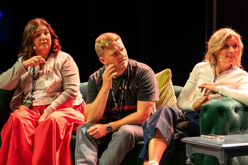 Three people on stage