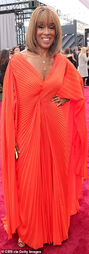 King accentuated her trim waist as she posed with her hands on her svelte waist