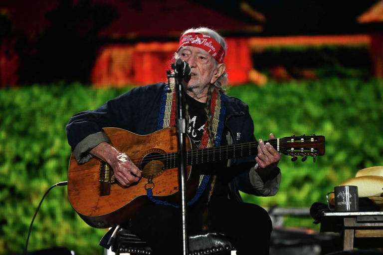 Willie Nelson performs at the 40th Anniversary of Farm Aid. Nelson created the concert series in 1985 to aid family farmers. (Provided by Brian Bruner/Farm Aid)