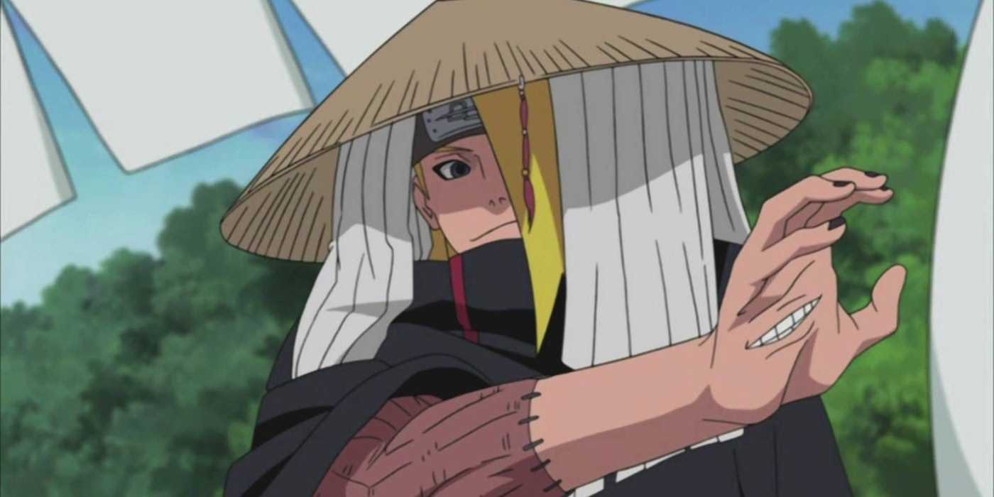 Deidara holding up his hand with an open mouth in Naruto
