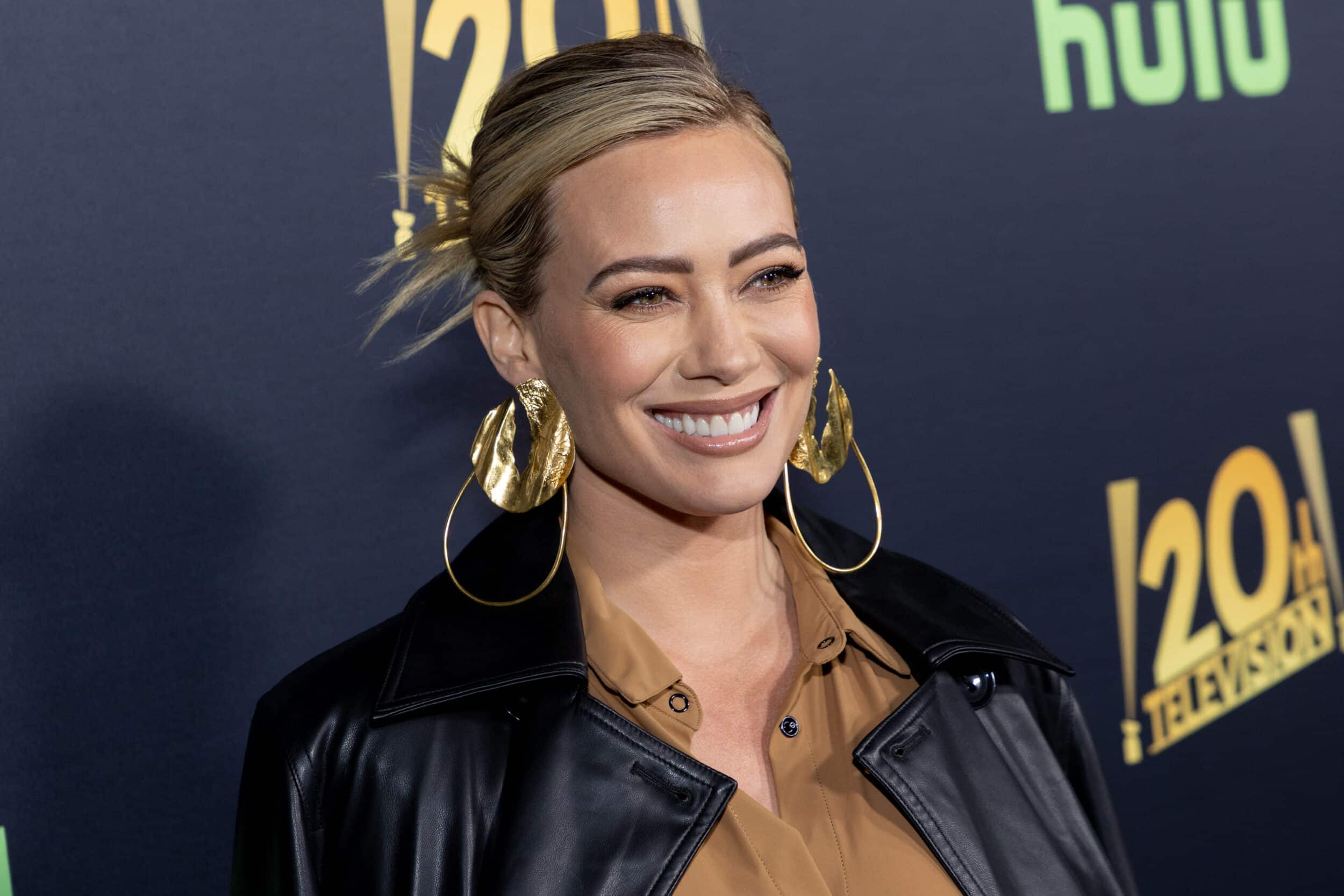 Hilary Duff admits she nearly left her kids on a plane in a brutally