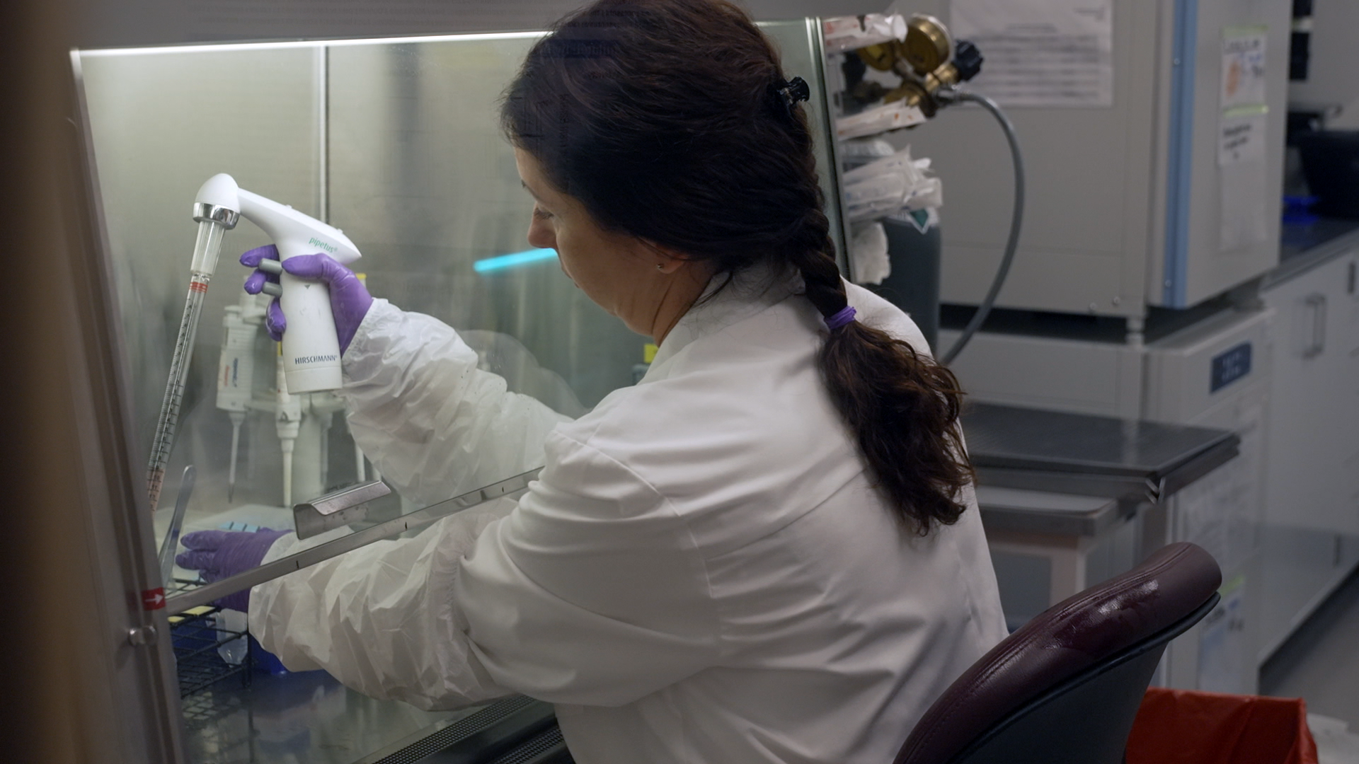 A scientist at Johns Hopkins Bloomberg School of Public Health works to develop organoids, or clusters of lab made human cells, which may one day replace animals in scientific testing. / Credit: Craig Olmstead / CBS News