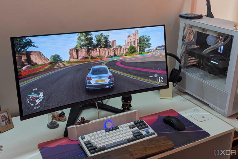 An ultrawide OLED monitor playing Forza Horizon 4