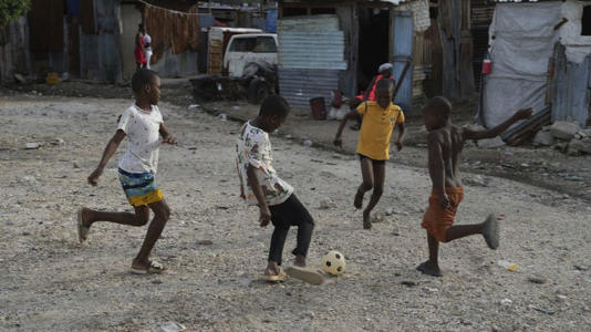 Children play soccer in the Simon-Pele neighborhood of Port-au-Prince, Haiti, 22 September 2025