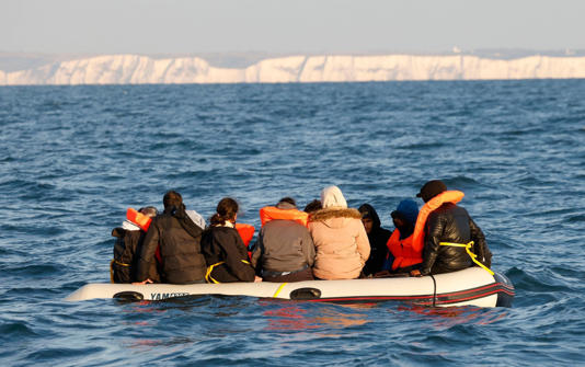 Migrants crossing the Channel in a small boat