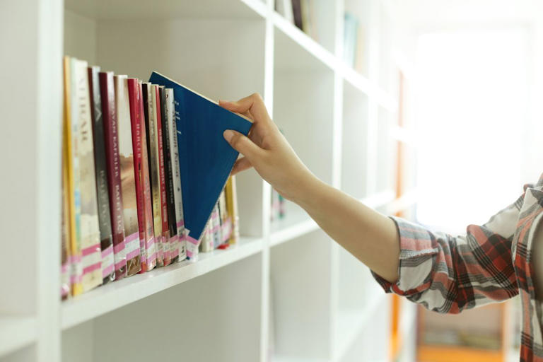 Organizing pros say this is the best way to arrange your books